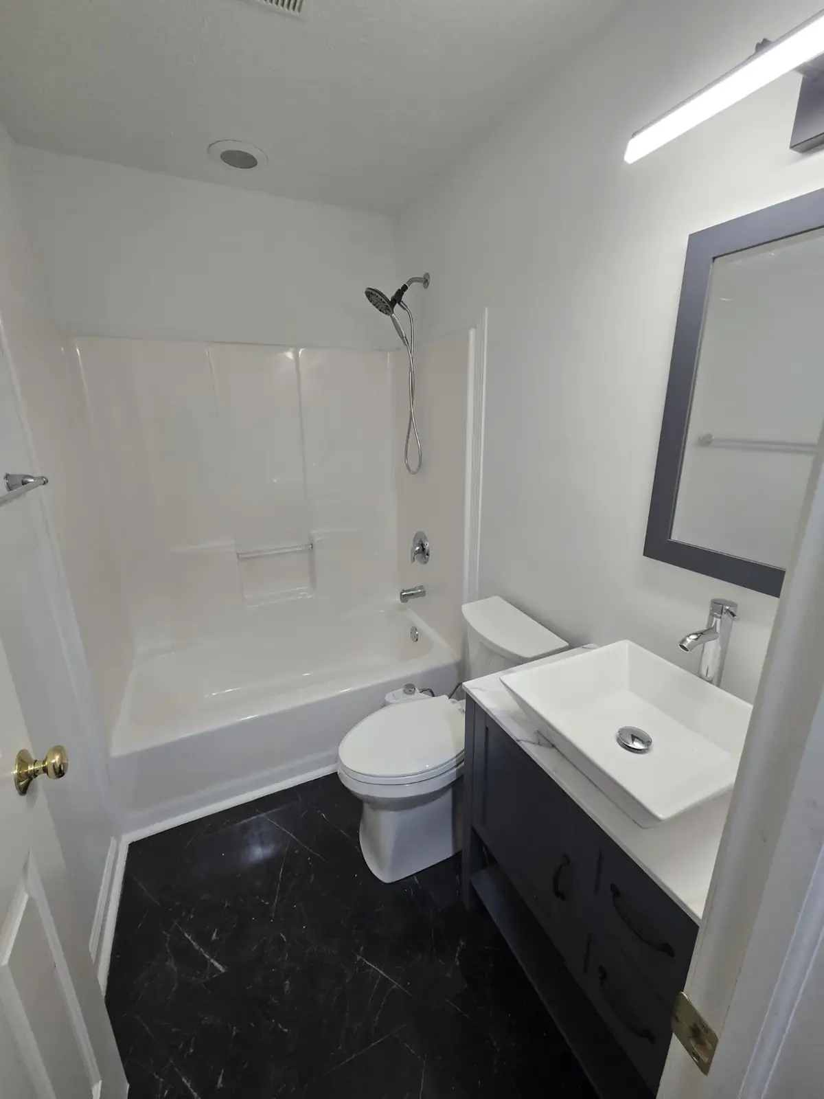 Custom walk-in shower with subway tile and built-in niche — Homerix Inc Carmel Indiana
