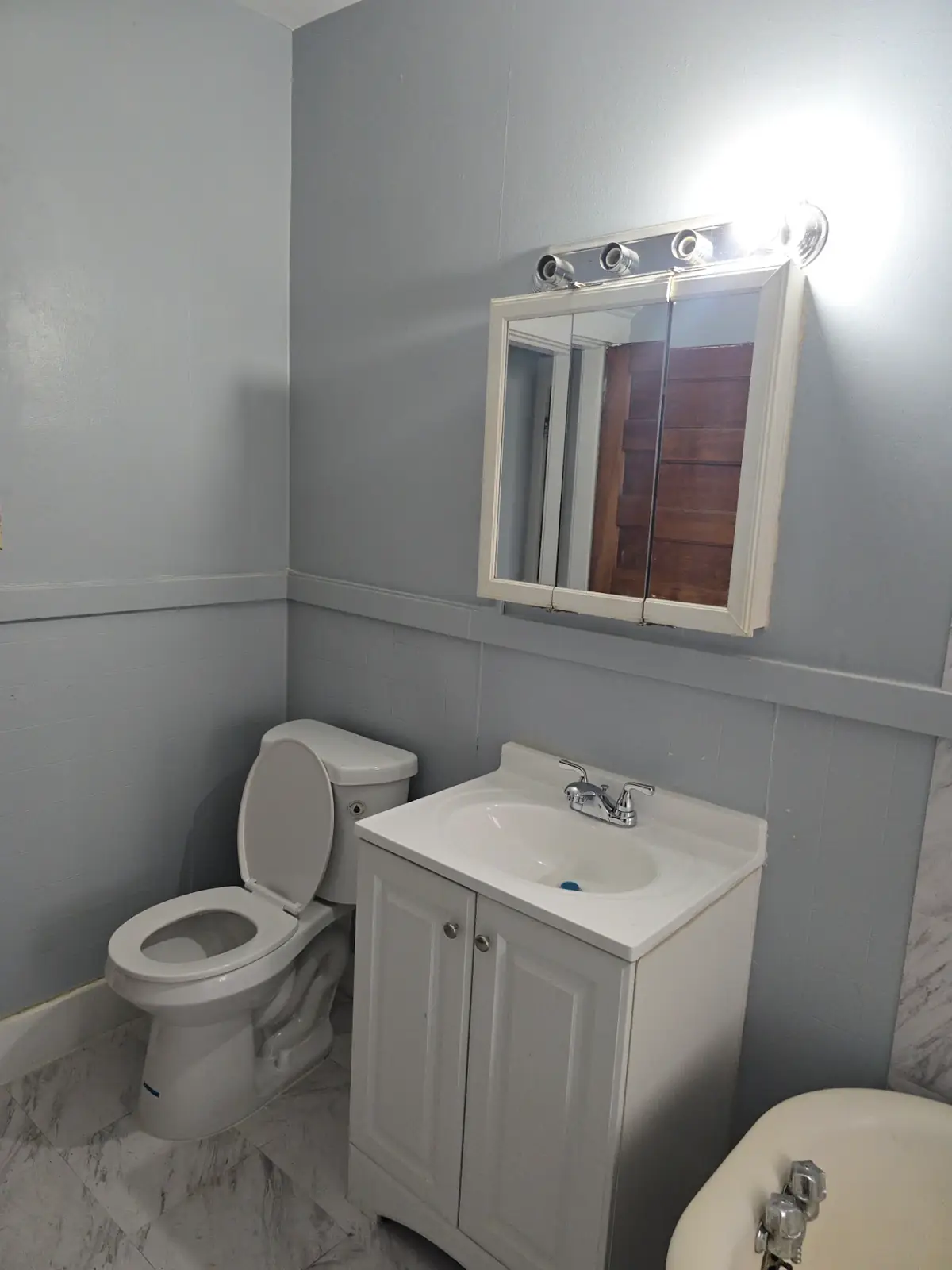 Dark tile master bathroom with black subway tile shower — Homerix Inc Noblesville Indiana