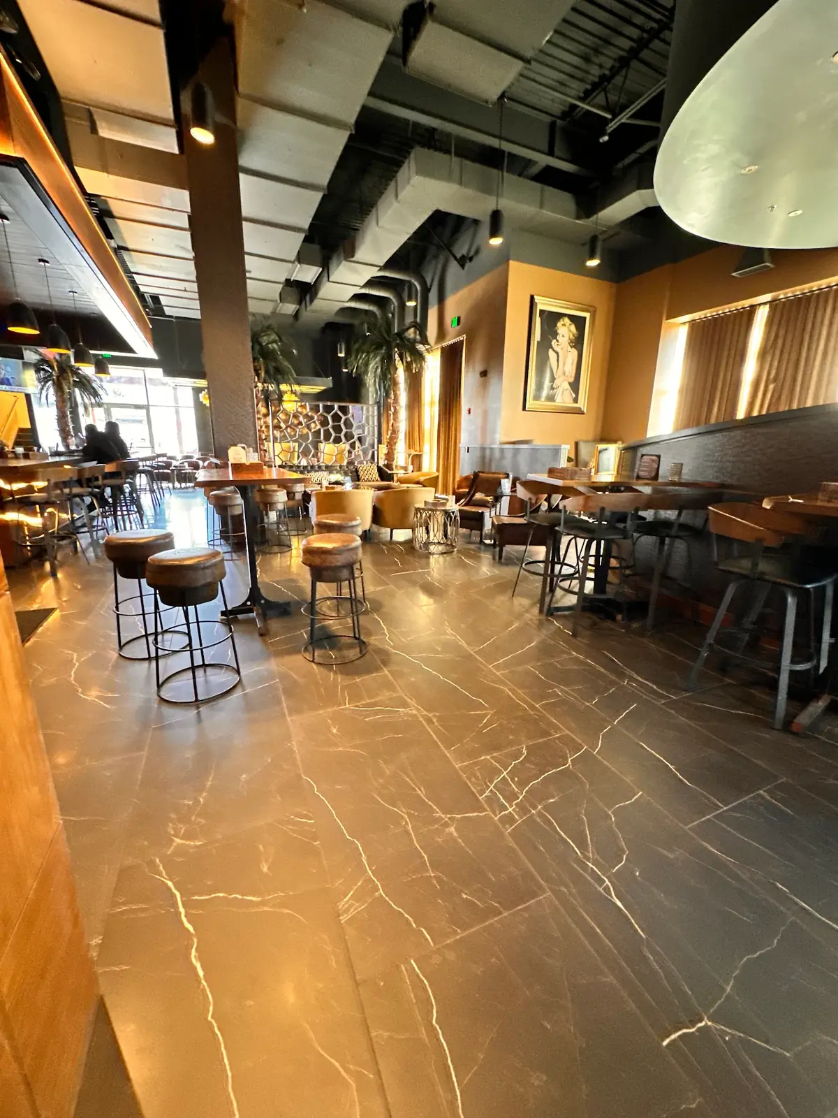 Premium commercial flooring installation at Havana Lounge Fishers Indiana — Homerix Inc